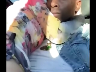 Waxen bitch rides black cock in a car